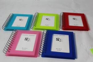 lot 34 image: Set of 5 Colorful Spiral Photo Frame Albums 4x6