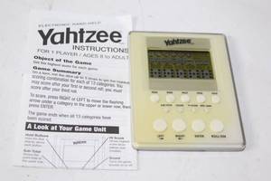 lot 124 image: Electronic Hand-Held Yahtzee Game with Instructions