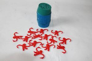 lot 125 image: Barrel of Monkeys Game with 14 Red Monkeys