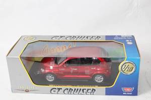 lot 151 image: Motormax 118 Chrysler PT Cruiser Diecast Model in Original Packaging