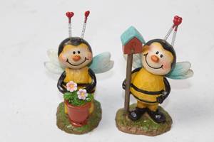 lot 195 image: Pair of Decorative Bee Figurines with Flowers and Birdhouse