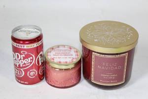 lot 258 image: Set of 3 Decorative Candles Feliz Navidad, Dragonfruit, and Dr Pepper Designs