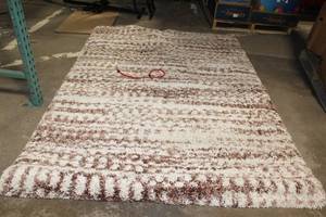 lot 277 image: Brown and White Textured Shag Rug - 62 x 86 Inches