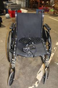 lot 283 image: Used Invacare Manual Wheelchair with Detachable Footrests