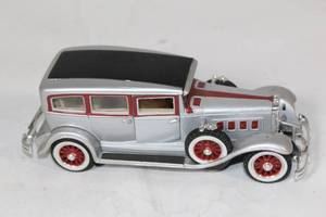 lot 291 image: Vintage Die-Cast Toy Car Model with Red Accents