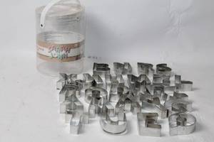 lot 302 image: Set of 26 Alphabet Metal Cookie Cutters with Original Container