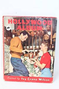 lot 329 image: Hollywood Album by Ivy Crane Wilson and Set of 3 Snow Globes