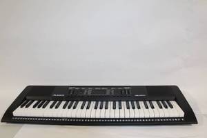 lot 391 image: Alesis Melody 61 Electronic Keyboard with 61 Keys and 300 Tones