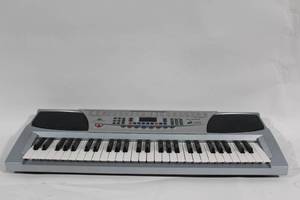 lot 392 image: Used Audster FK-5400 Electronic Keyboard with 100 Voices and 100 Styles