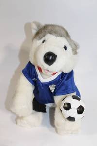 lot 445 image: Plush Siberian Husky Toy in Soccer Outfit with Soccer Ball - 17 Inch