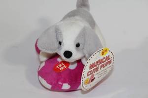 lot 450 image: Musical Cute Pups Plush Toy with Heart Pillow