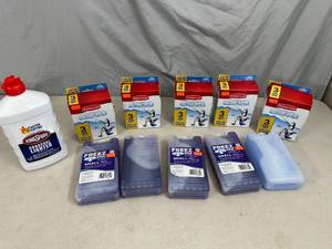 lot 69 image: New Ice Packs and Charcoal Lighter Fluid