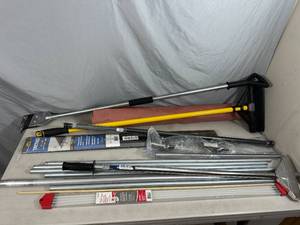 lot 74 image: New and Used Floor Scrapers. Duct Cleaning Rods, Threshold, and More