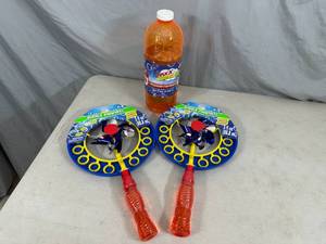 lot 104 image: New Bubble Pinwheels and Large Bottle of Bubble Solution