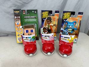 lot 114 image: New Pokemon, Star Wars, and Minecraft Toys
