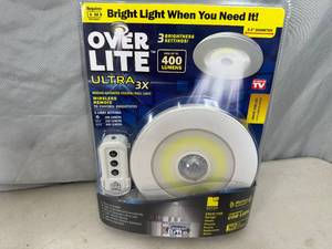 lot 175 image: New Over Lite Remote Controlled  Motion Activated Light Fixture
