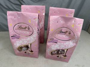 lot 218 image: 4 New Bags of Lindt Special Edition Neapolitan White Chocolate Truffles.