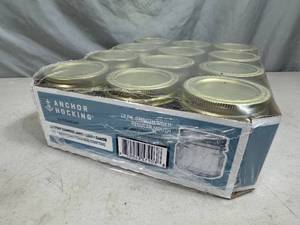 lot 228 image: 12 New Anchor Hocking Canning Jars - 12 Pint Regular Mouth