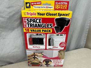 lot 249 image: New Pack of 18 Ruby Space Triangles For Closet Organization