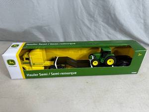 lot 297 image: New John Deere Semi Truck Hauler and Tractor Toy