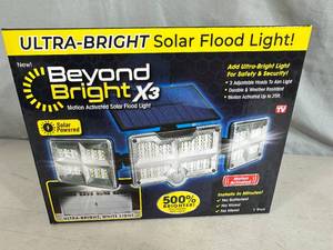 lot 301 image: New Beyond Bright X3 Solar Powered Floodlight
