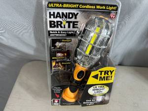 lot 311 image: New Handy Brite Cordless LED Worklight