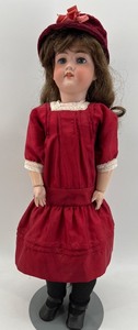 lot 20 image: Antique Armand Marseille 390 Bisque Head Doll in Red Dress