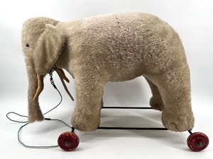 lot 22 image: Vintage Steiff Plush Elephant on Wheels
