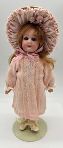 lot 45 image: Vintage SIMON HALBIG Porcelain Doll with Pink Dress and Bonnet