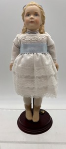 lot 66 image: Porcelain Doll with Lace Dress on Stand