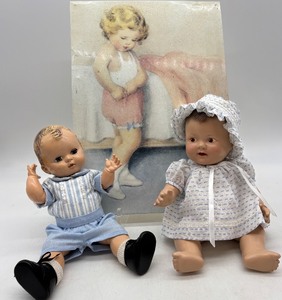 lot 69 image: Vintage Dolls and Wall Art Set - 2 Dolls and 1 Tin Artwork Piece