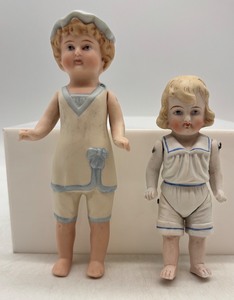 lot 75 image: Pair of Vintage Bisque Porcelain Dolls in Bathing Outfits