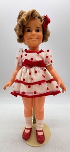 lot 78 image: Vintage Vinyl Shirley Temple Doll with Red Polka Dot Dress and Socks