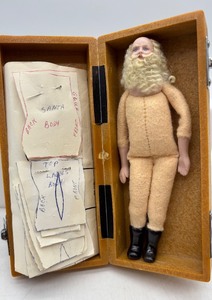 lot 123 image: Handcrafted Santa Claus Doll with Detailed Patterns by Cathy Hansen