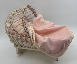 lot 141 image: Vintage Wicker Doll Baby Cradle with Pink Bedding