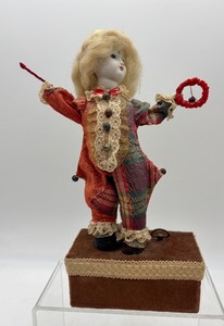 lot 144 image: Vintage Clown Automaton Music Box with Fabric Costume