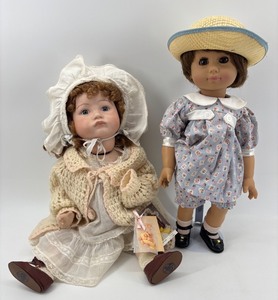 lot 147 image: Pair of SFBJ Dolls in Vintage Clothing