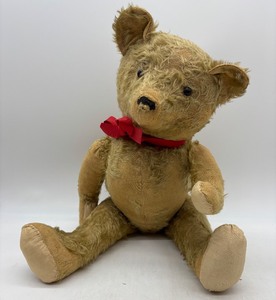 lot 149 image: Vintage Stuffed Teddy Bear Toy with Red Bow