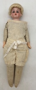 lot 157 image: Vintage Armand Marseille Porcelain Doll in Victorian Outfit with Spare Undergarments
