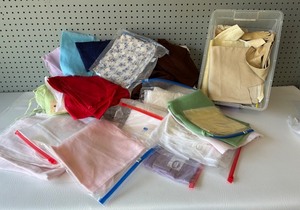 lot 182 image: Assorted Fabric Bundle with Various Patterns and Textures