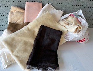 lot 207 image: Assorted Lot of Fabric Scraps Including Fleece, Wool, and Cotton