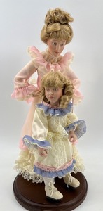 lot 236 image: Mothers Loving Touch Porcelain Doll Set