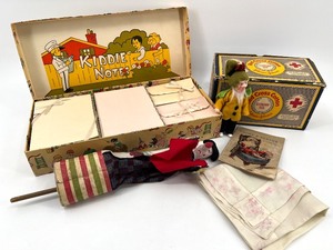 lot 243 image: Vintage Collection Kiddie Notes Box with Punch Puppet, Rhyme & Reason by Palmer Cox, and Decorative Handkerchief