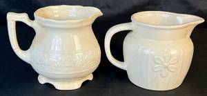 lot 25 image: Vintage Off White Embossed Footed Creamer and Vintage Creamer with Daisy