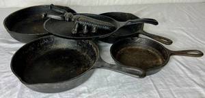 lot 32 image: Cast Iron Collection - Boot Jack Beetle and pans