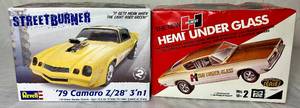 lot 50 image: Revell 79 Camaro z28 3 in 1 Model Kit and Plymouth Barracuda Hurst HEMI Under Glass 125 Scale Model Kit