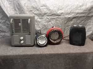 lot 7 image: Collection of 4 Portable Space Heaters in Various Designs