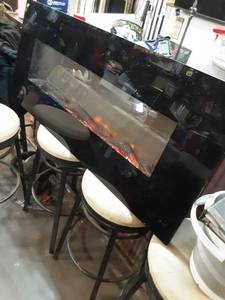 lot 16 image: Electric Wall-Mounted Fireplace with Glass Front