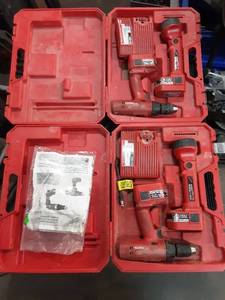 lot 18 image: Milwaukee Cordless Drill and Driver Set with Case