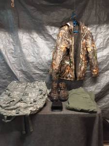 lot 29 image: Complete Hunting Gear Set with Realtree Jacket, Camping Backpack, and Boots